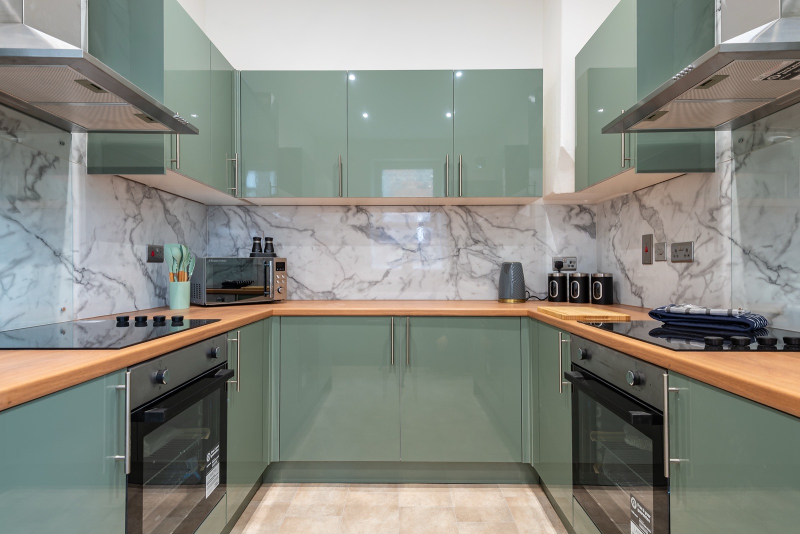 Kitchen at Ash Grove House, Hull — sage green cabinets